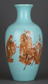 A TURQUOISE-GREEN GLAZED AND IRON-RED GILT DECORATED 'FORTUNE AND SHOU' VASE