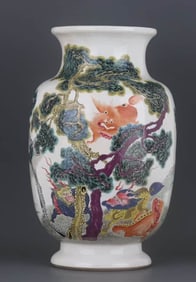 A FAMILLE ROSE 'PINE AND LUCKY BEAST' LANTERN SHAPED VASE