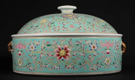 A FAMILLE ROSE 'INTERLOCKING FLORAL' COOKING POT