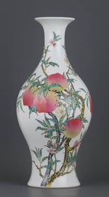 A FAMILLE ROSE 'EIGHT PEACHES' OVAL SHAPED VASE