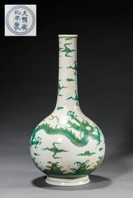 A GREEN-GLAZED 'CLOUD DRAGON' VASE