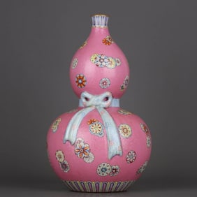 A PINK-GLAZED AND FALANGCAI 'SKIN-BALL AND RIBBON' GOURD SHAPED VASE