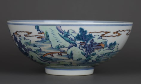 A DOUCAI 'LANDSCAPE AND FIGURAL' BOWL