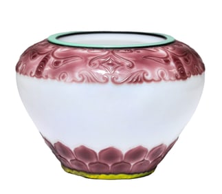 A PURPLE MATERIAL WITH WHITE MATERIAL 'BEAST FACE' BOWL