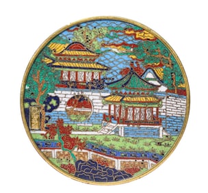 A CLOISONNé BLUE AND WHITE COPPER MIRROR