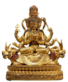 A COPPER-GILT BUDDHA STATUE