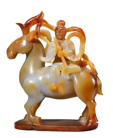 AN AGATE CARVED FIGURE