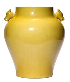 A YELLOW-GLAZED JAR