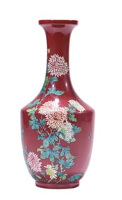 A RED GROUND FAMILLE ROSE 'FLORAL' VASE
