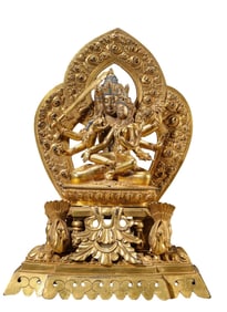 A COPPER-GILT BUDDHA STATUE