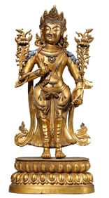 A COPPER-GILT LOTUS HAND AVALOKITESHVARA