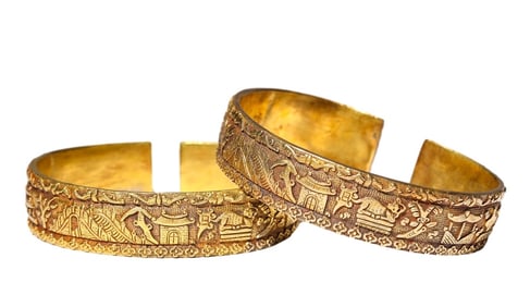 A PAIR OF SILVER-GILT BRACELETS