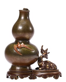 A BRONZE-IMITATING GLAZED GOURD SHAPED VASE