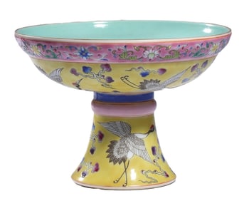 A YELLOW-GROUND WUCAI 'CLOUDS AND CRANES' STEM DISH