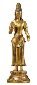 A COPPER-GILT STANDING AVALOKITESHVARA STATUE