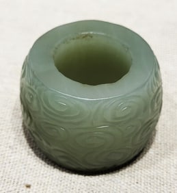 A JADE 'WHORL CLOUDS'  HAIRPIN