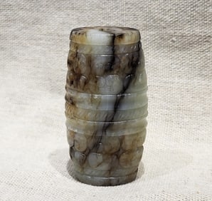 A JADE 'HOOK-AND-CLOUD' TUBE