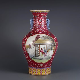 A RUBY-RED GROUND FAMILLE ROSE MEDALLION 'COUNTRY SCENE' VASE