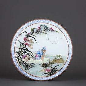 A RUBY-RED GROUND FAMILLE ROSE MEDALLION 'FISHING SCENE' COVERED BOX