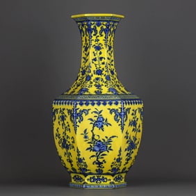 A YELLOW-GLAZED BLUE AND WHITE 'THREE FLOWERS AND THREE FRUITS' VASE