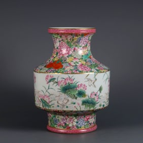 A GOLD-GROUND FAMILLE ROSE 'FLORAL WITH EGRET' VASE