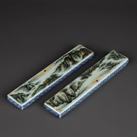 PAIR OF BLUE AND WHITE WITH FAMILLE ROSE 'LANDSCAPE' PAPERWEIGHTS