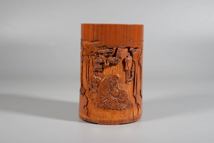 A BAMBOO 'SCHOLAR UNDER PINE' BRUSH POT