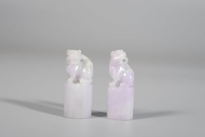 A PAIR OF LAVENDER JADEITE 'LION' SEALS