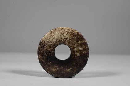 AN ARCHAIC JADE BI