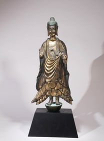 A GILT-BRONZE SANDALWOOD BUDDHA
