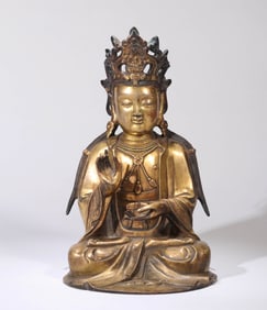 A GILT-BRONZE GUANYIN