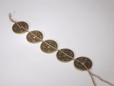 FIVE BRONZE COINS