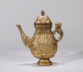 A GILT-BRONZE 'BEAST MASK' EWER