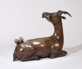 A GILT-BRONZE SILVER-INLAID 'SIKA DEER'