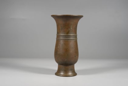 A BRONZE 'MYSTIC' VASE