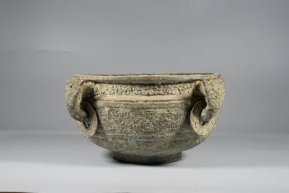 A BRONZE FOUR-LOOP CENSER