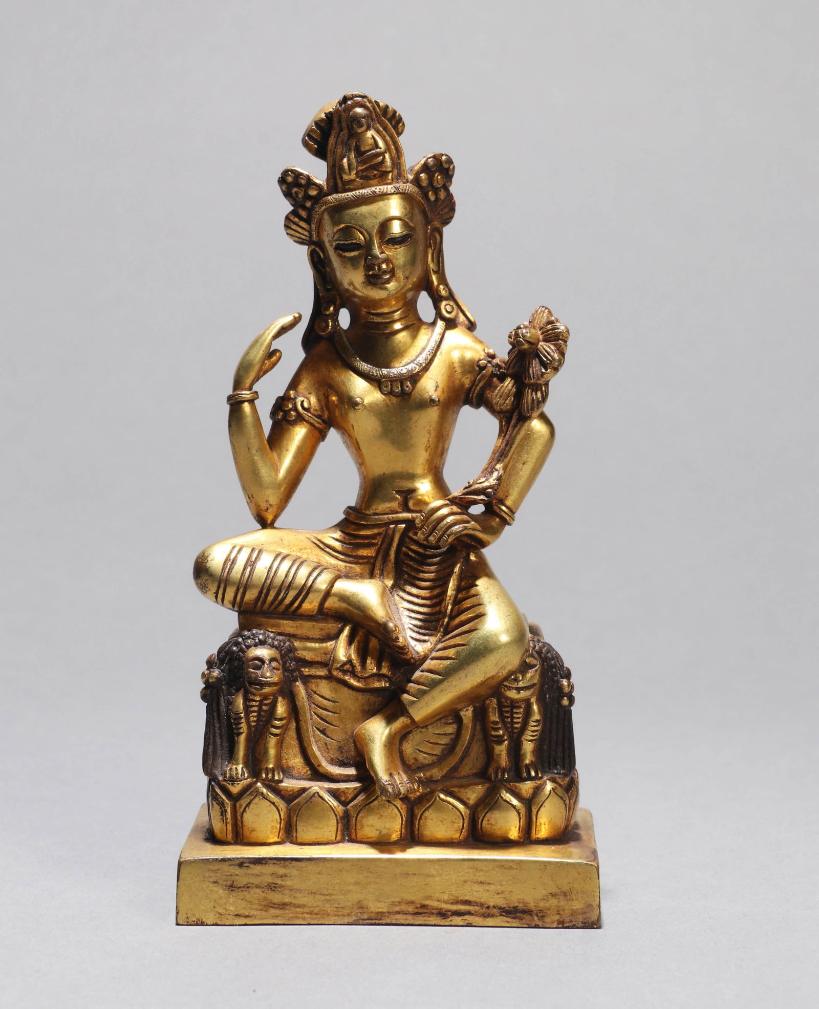 A GILT-BRONZE FIGURE OF A BODHISATTVA