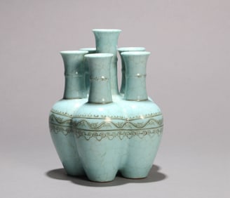 A TURQUOISE-GROUND VASE
