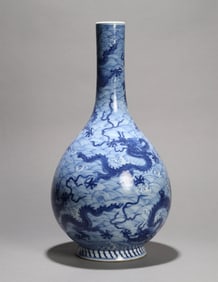 A RESERVE-DECORATED BLUE AND WHITE 'DRAGON' VASE