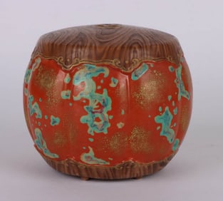 A WOOD GLAZED GARDEN STOOL
