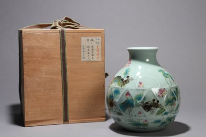 A CELADON-GLAZED FAMILLE-ROSE 'LOTUS' JAR