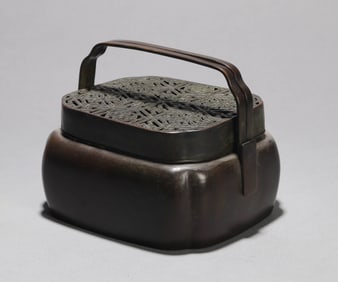 A COPPER HANDWARMER