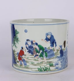 A BLUE AND WHITE WUCAI 'FISHING' BRUSHPOT
