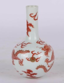 AN IRON-RED 'DRAGON' SMALL VASE
