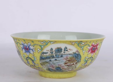 A YELLOW-GROUND FAMILLE-ROSE 'LANDSCAPE' BOWL