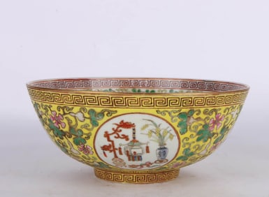 A YELLOW-GROUND FAMILLE-ROSE MEDALLION 'BOGU' BOWL