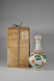 A FAMILLE ROSE 'CRANE, DEER AND SPRING' GARLIC-HEAD VASE