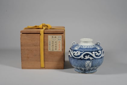 A BLUE AND WHITE 'SCROLLS' SMALL JAR