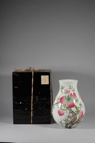 A FAMILLE ROSE 'NINE PEACHES' VASE