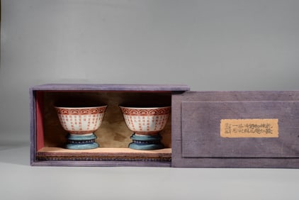 A PAIR OF IRON-RED 'IMPERIAL POEM' BOWLS